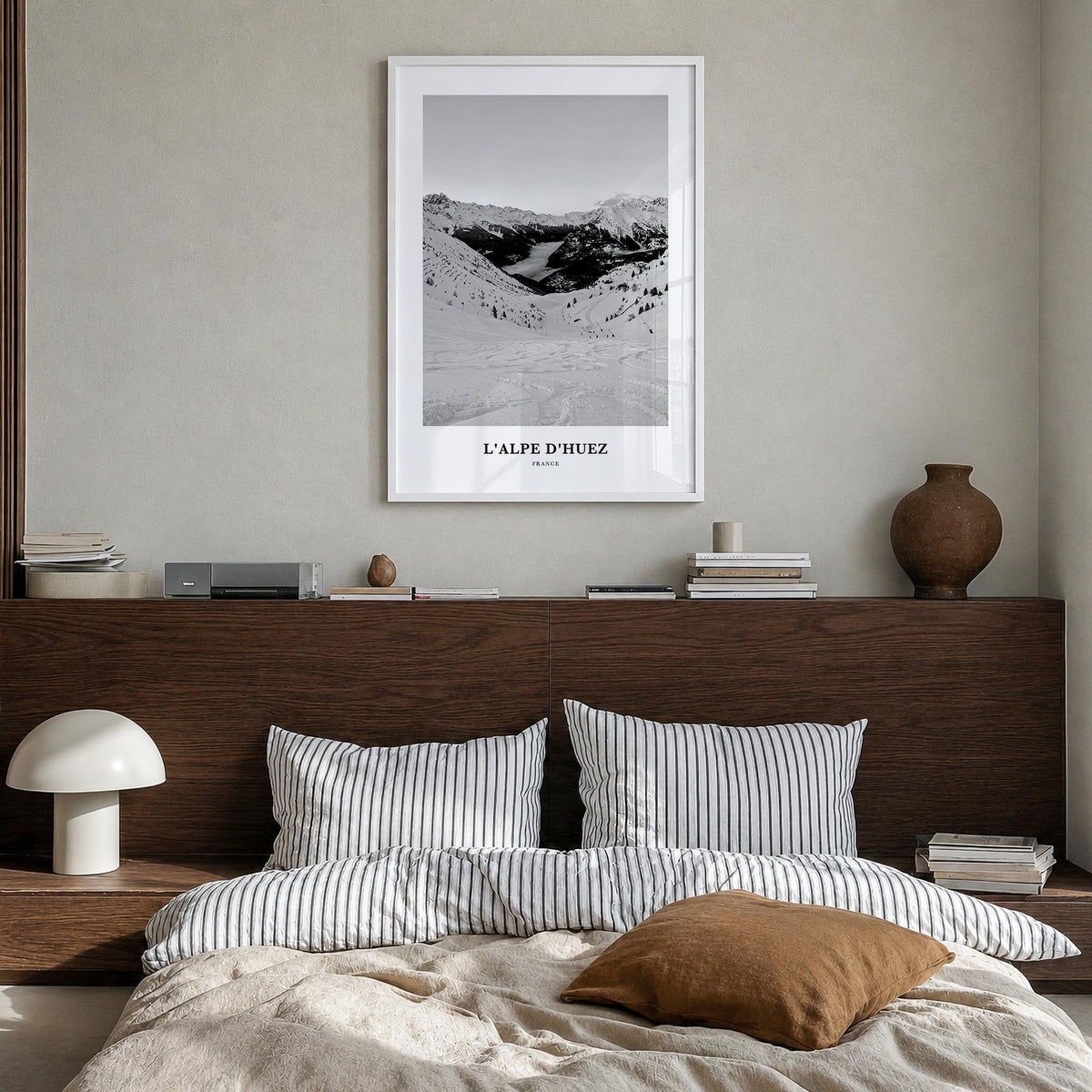 L'Alpe d'Huez black & white classic poster of France – vertical wall art in white wood frame, hanging on wall