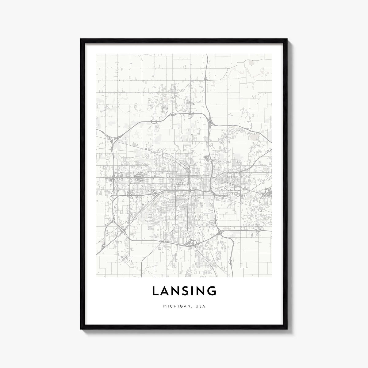 Lansing black & white map poster of Michigan, USA – vertical wall art, unframed print shown in interior mockup