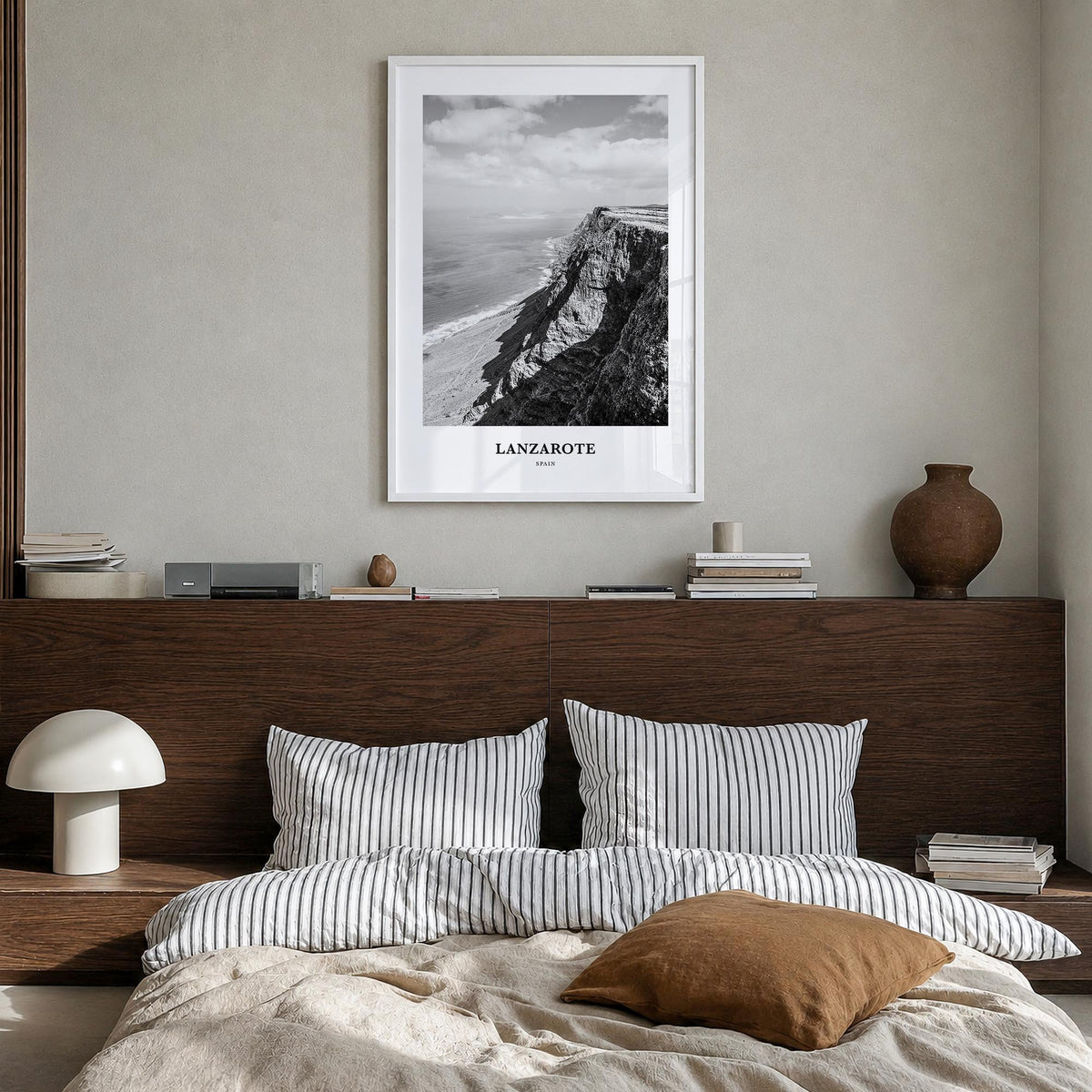 Lanzarote black & white classic poster of Spain – vertical wall art in white wood frame, hanging on wall