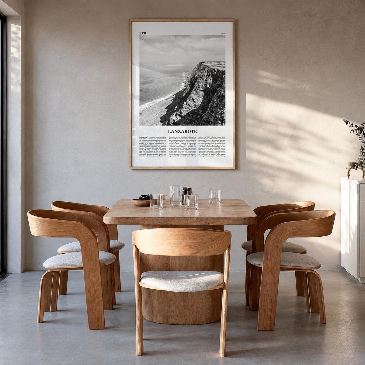 Lanzarote black & white newspaper poster of Spain – vertical wall art in natural wood frame, hanging on wall