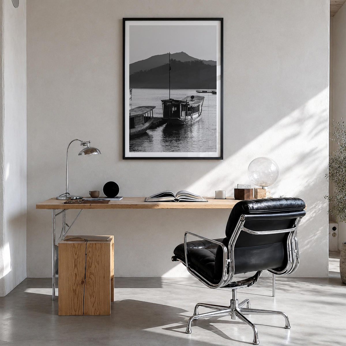 Laos black & white photo poster of Asia – vertical wall art in black wood frame with white border, hanging on wall