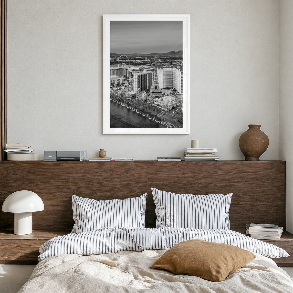 Las Vegas Photo Poster in a white wood frame, hanging in a bedroom, white border
