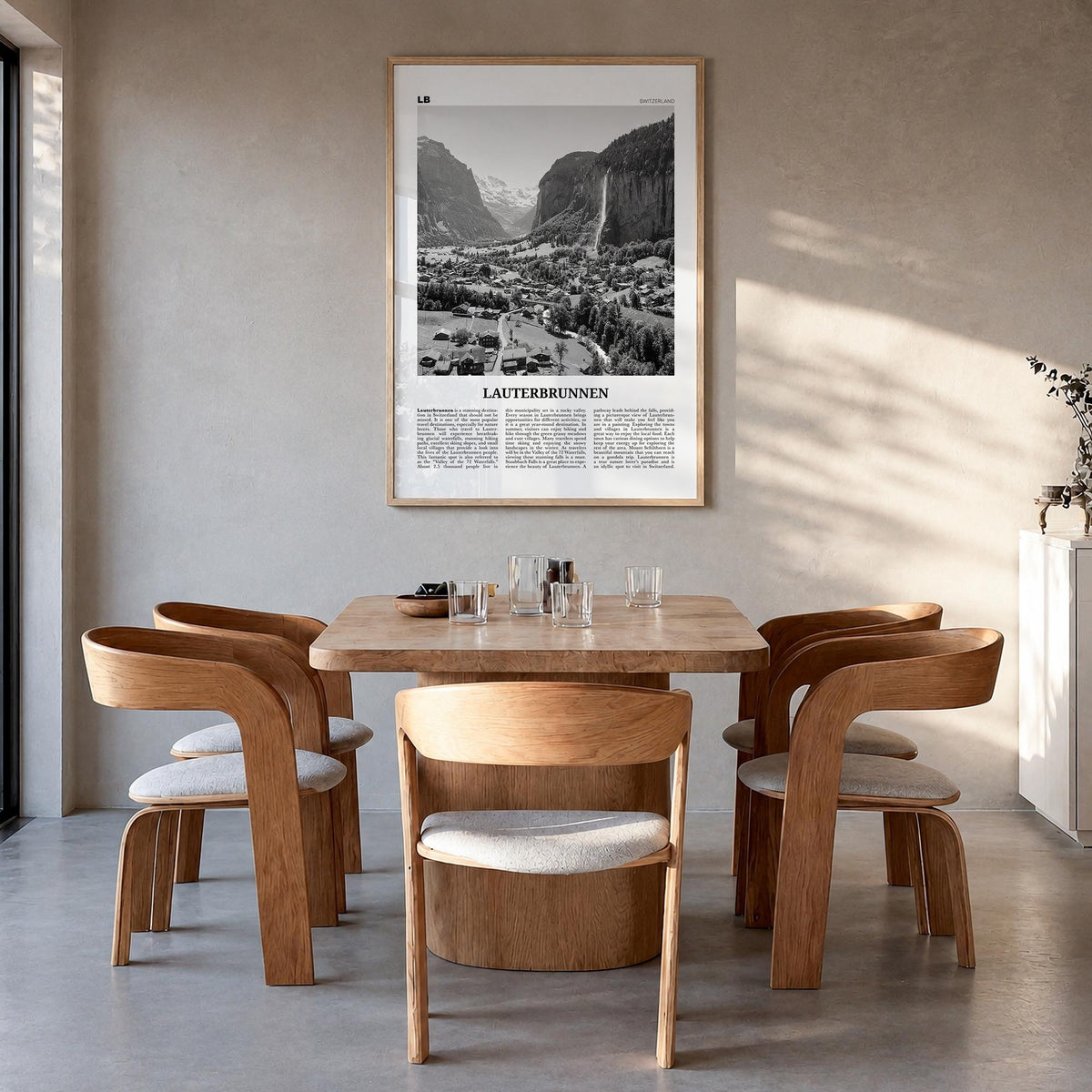 Lauterbrunnen black & white newspaper poster of Switzerland – vertical wall art in natural wood frame, hanging on wall