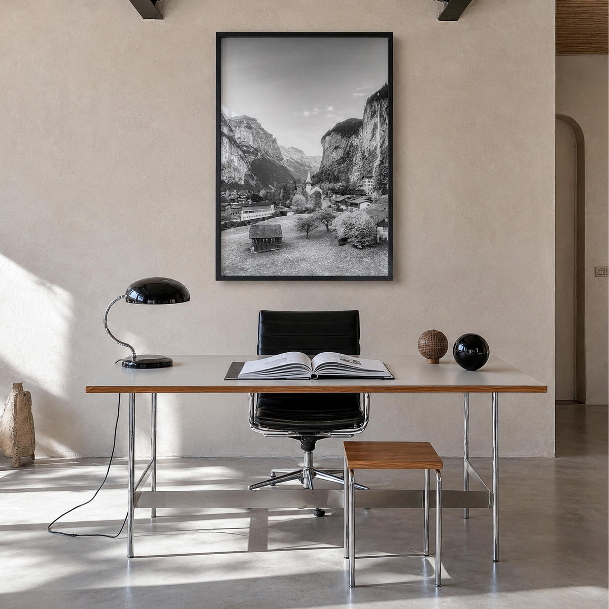 Lauterbrunnen black & white photo poster of Switzerland – vertical wall art in black wood frame, hanging on wall