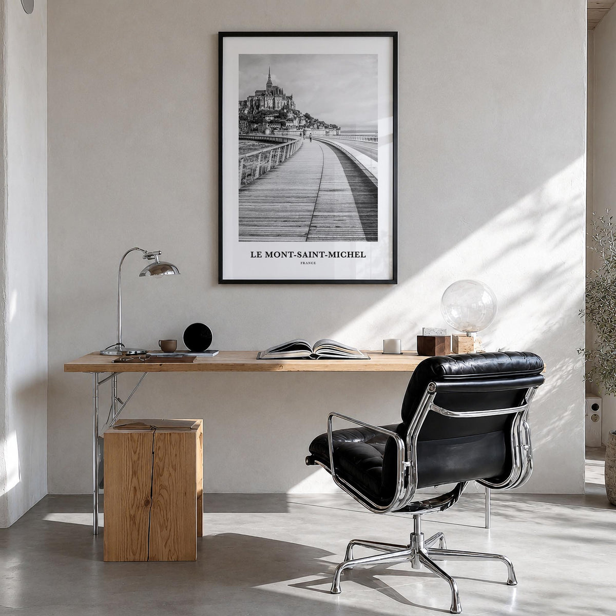 Le Mont-Saint-Michel black & white classic poster of France – vertical wall art in black wood frame, hanging on wall