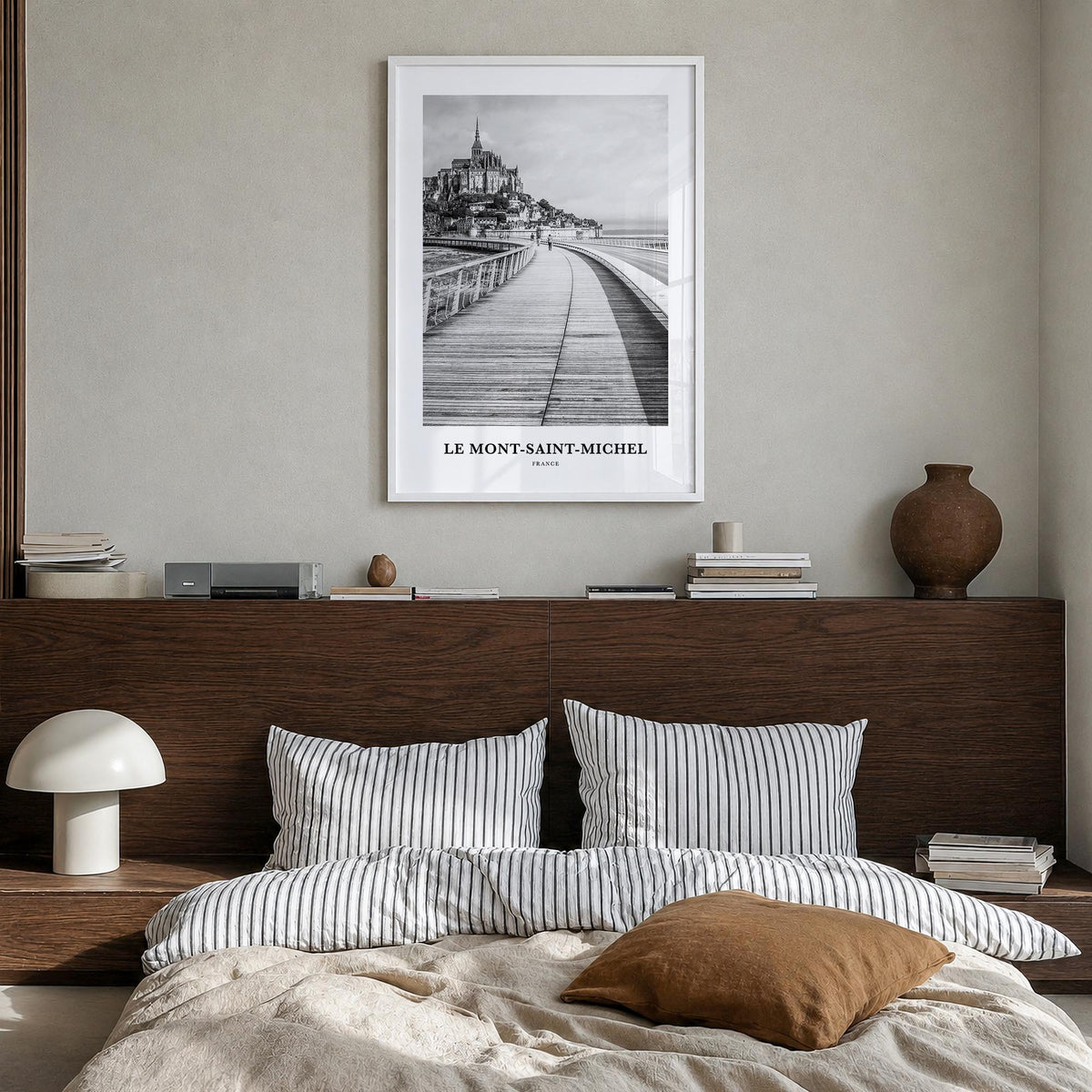 Le Mont-Saint-Michel black & white classic poster of France – vertical wall art in white wood frame, hanging on wall