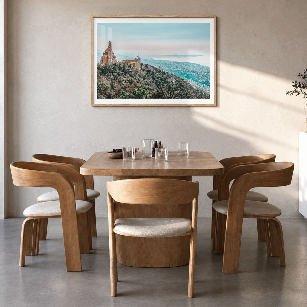 Lebanon Photo Poster in a natural wood frame, hanging in a dining room, white border