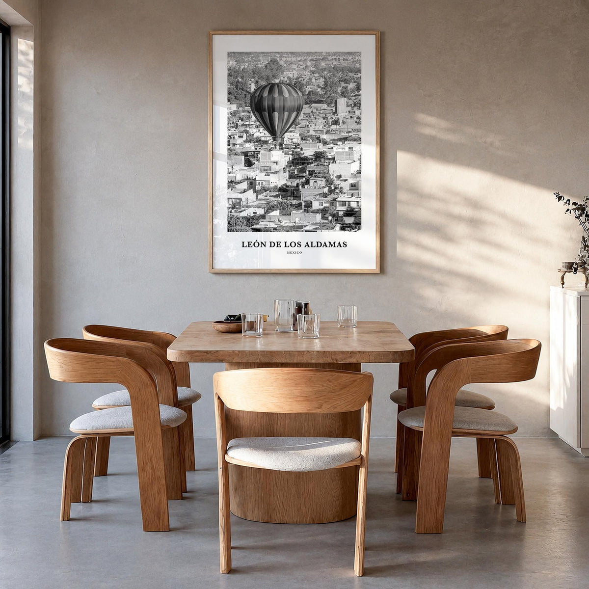 León de los Aldamas black & white classic poster of Mexico – vertical wall art in natural wood frame, hanging on wall