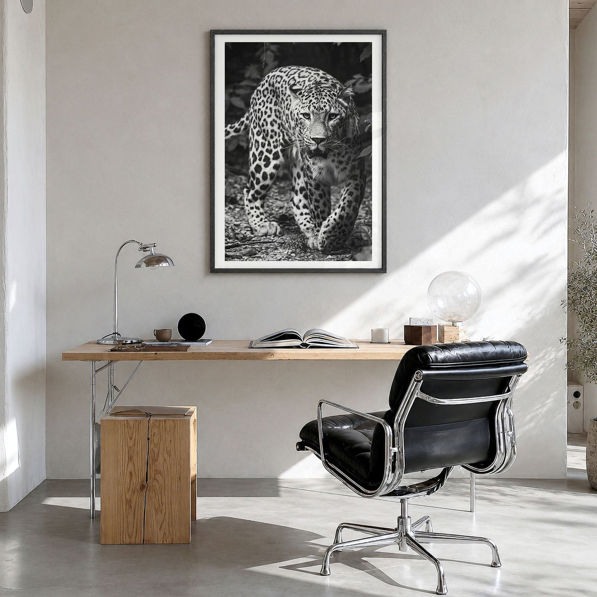 Leopard Photo No 1 Poster in a black wood frame, hanging in a bright home office, white border