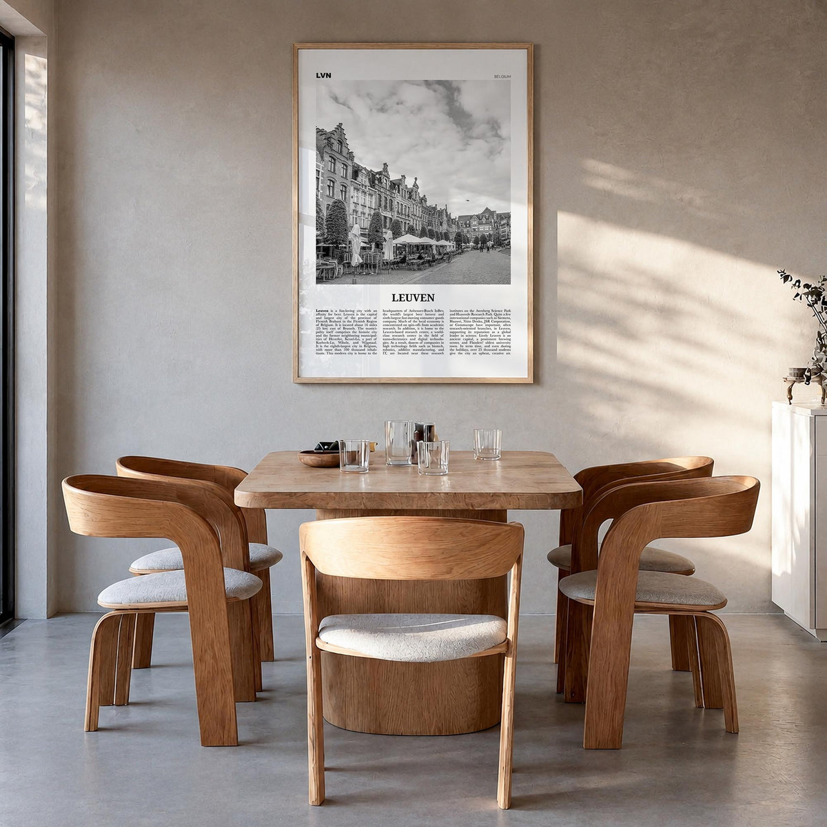 Leuven no. 1 black & white newspaper poster of Belgium – vertical wall art in natural wood frame, hanging on wall