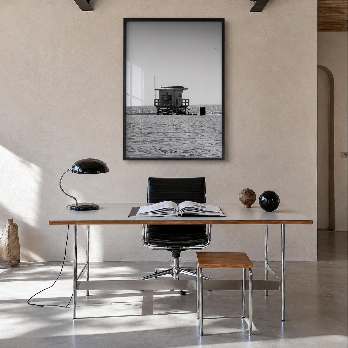 Lifeguard Stand no. 1 black & white photo poster – vertical wall art in black wood frame, hanging on wall