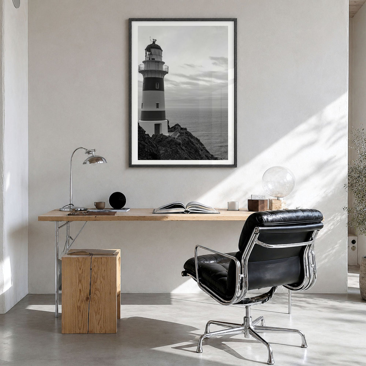 Lighthouse Photo No 2 Poster in a black wood frame, hanging in a bright home office, white border