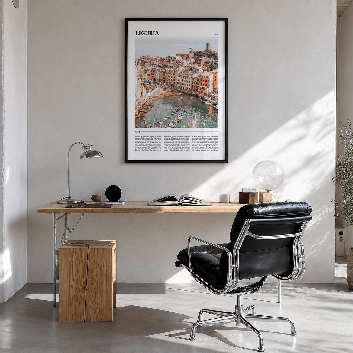 Liguria colorful travel poster of Italy – vertical wall art in black wood frame, hanging on wall