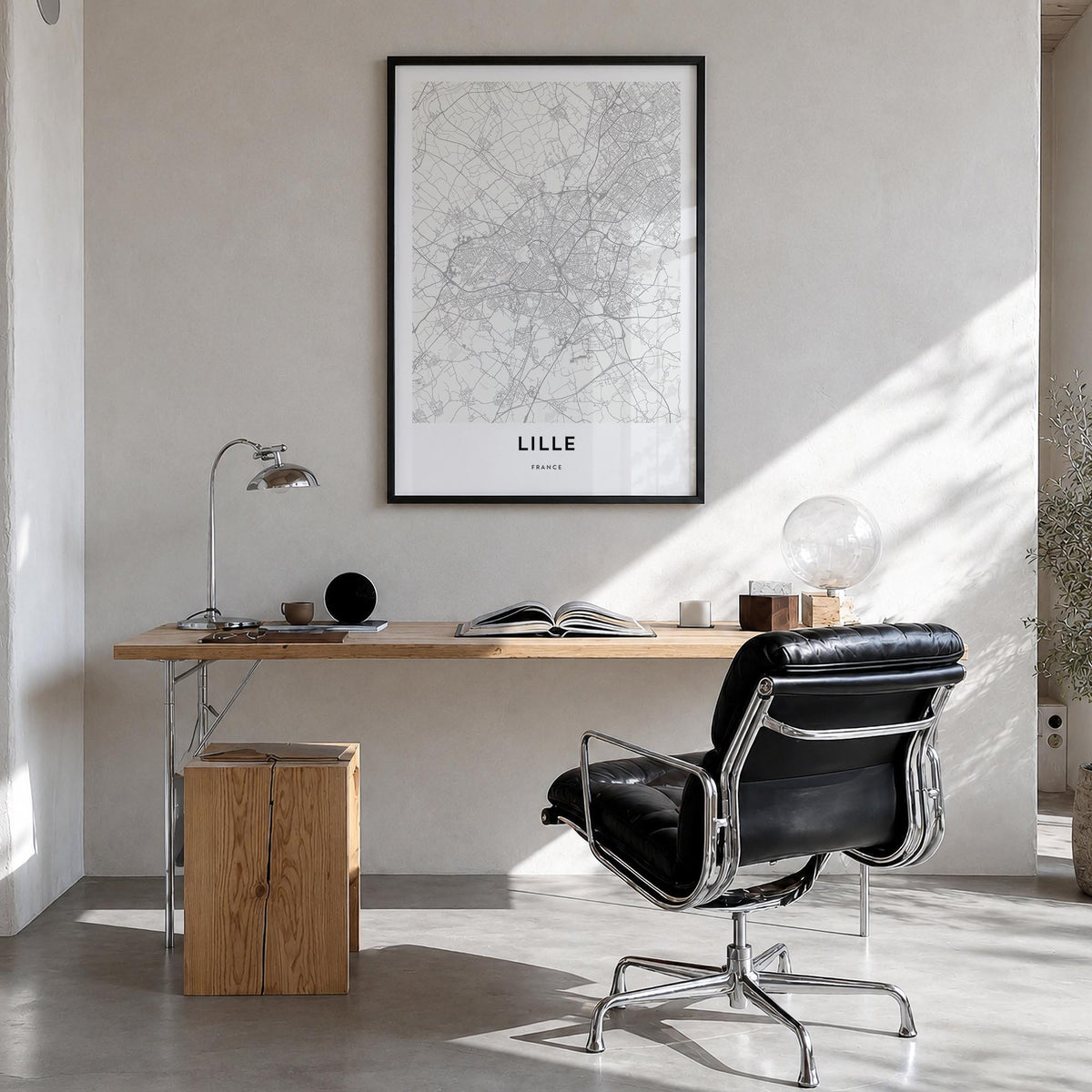 Lille black & white map poster of France – vertical wall art in black wood frame, hanging on wall