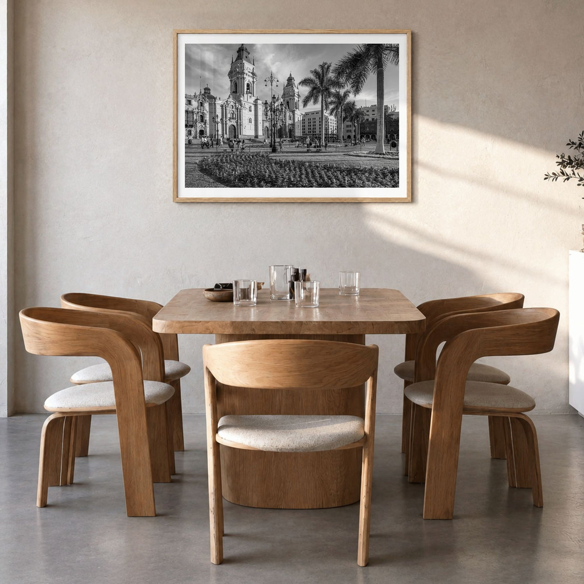 Lima Photo Poster in a natural wood frame, hanging in a dining room, white border