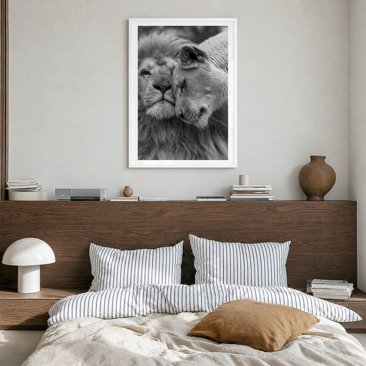 Lion Photo No 2 Poster in a white wood frame, hanging in a bedroom, white border