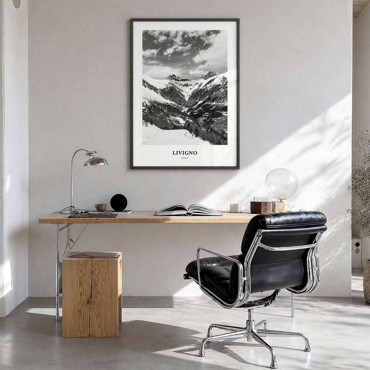 Livigno Classic Poster in a black wood frame, hanging in a bright home office