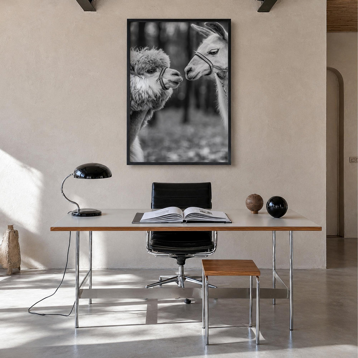 Llama black & white photo poster – vertical wall art in black wood frame, hanging on wall