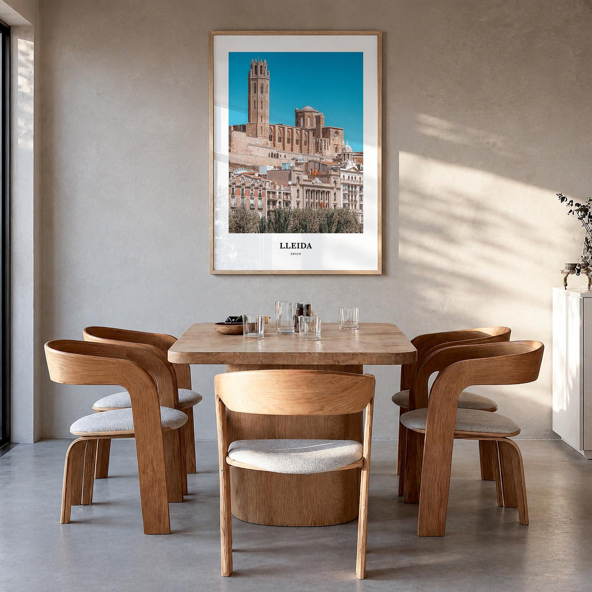 Lleida colorful classic poster of Spain – vertical wall art in natural wood frame, hanging on wall