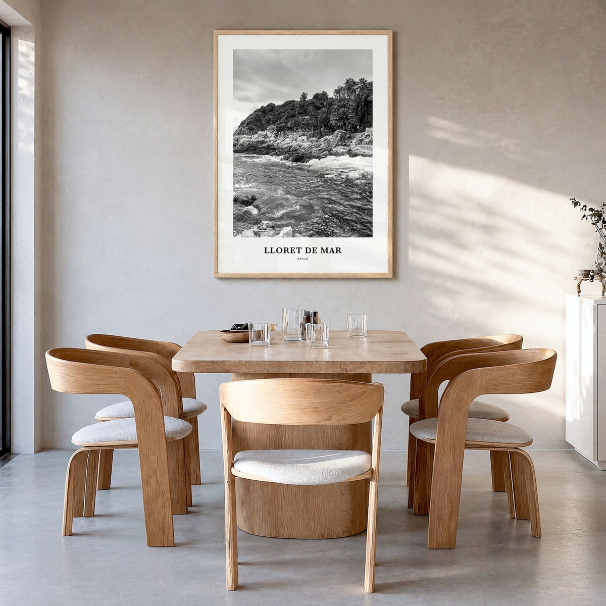 Lloret de Mar Classic Poster in a natural wood frame, hanging in a dining room