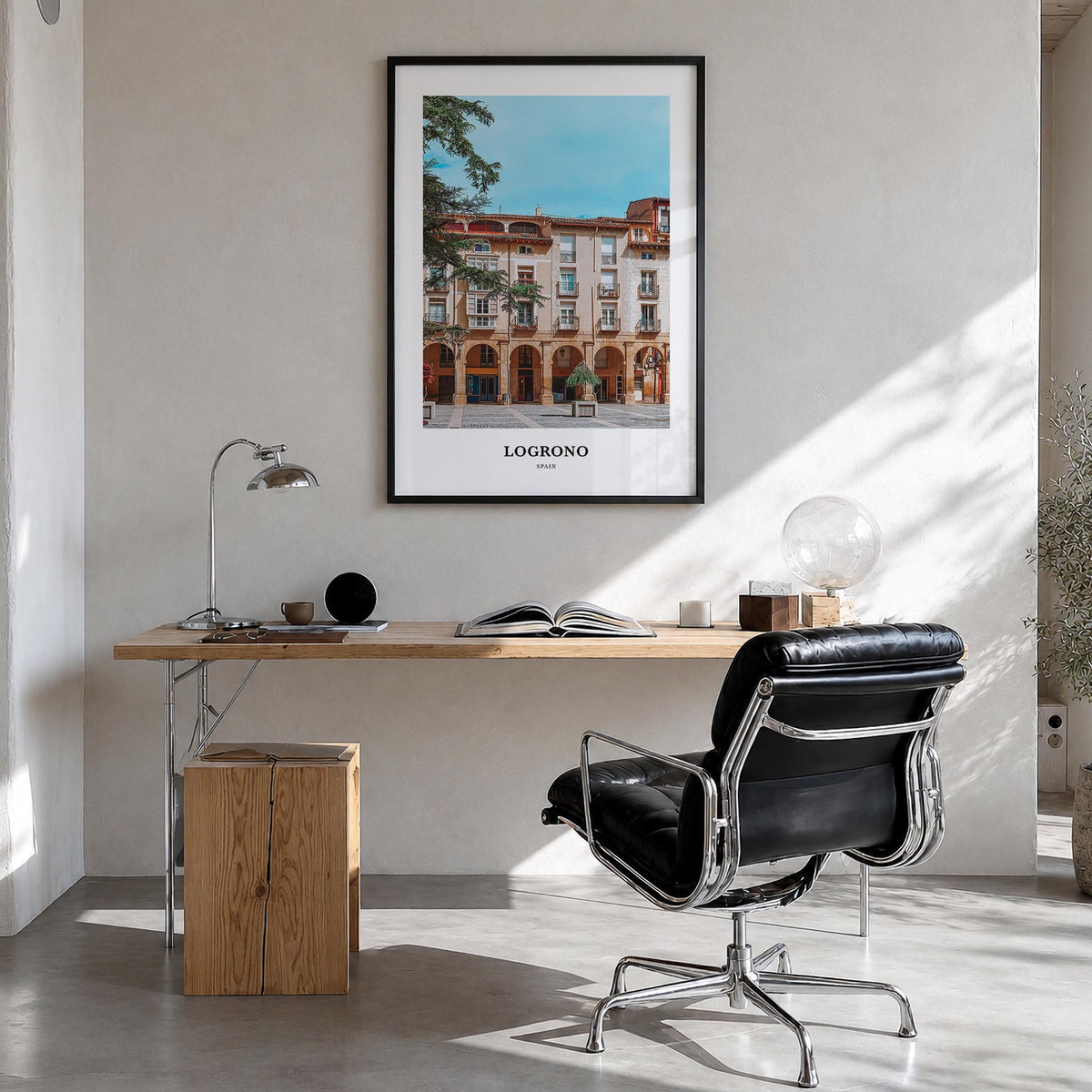 Logroño colorful classic poster of Spain – vertical wall art in black wood frame, hanging on wall