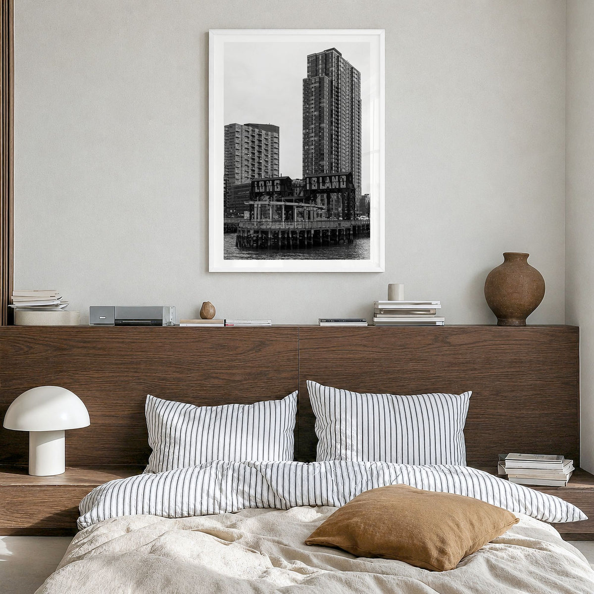 Long Island City Photo Poster in a white wood frame, hanging in a bedroom, white border