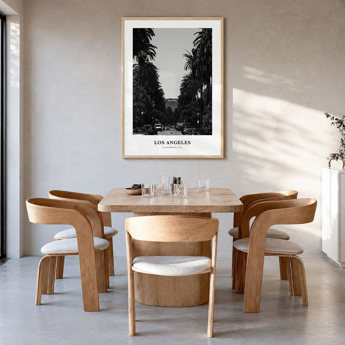 Los Angeles Classic No 2 Poster in a natural wood frame, hanging in a dining room