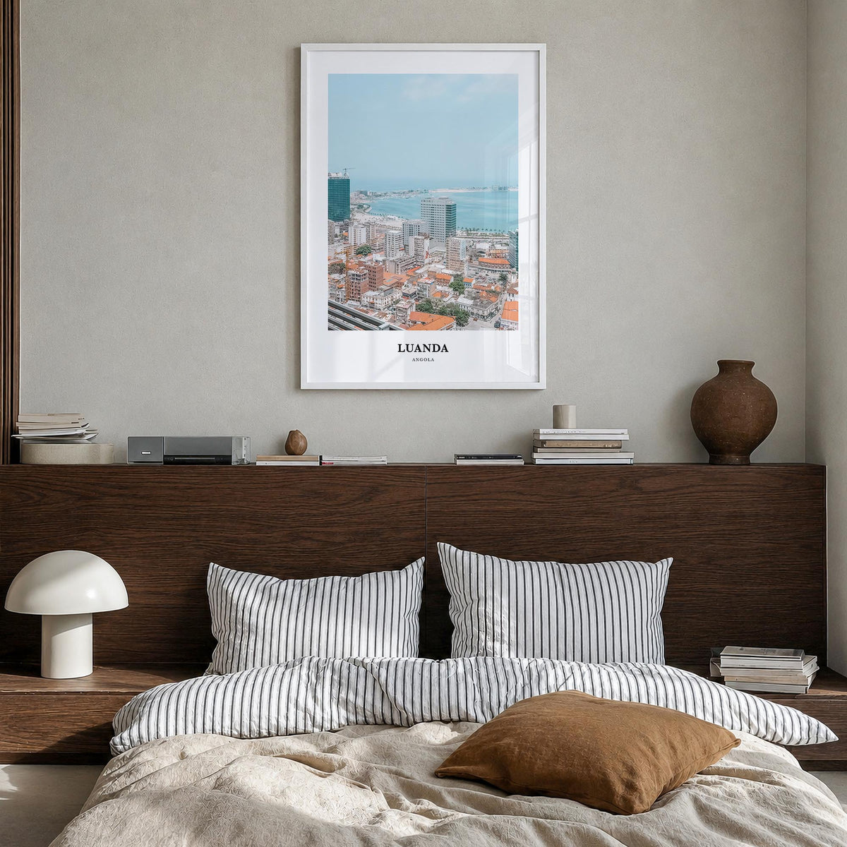 Luanda colorful classic poster of Angola – vertical wall art in white wood frame, hanging on wall