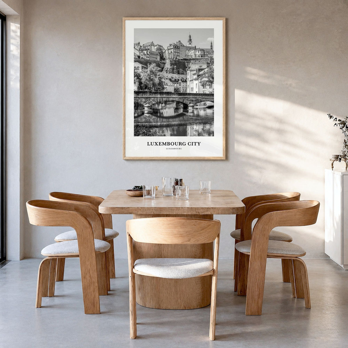 Luxembourg City Classic Poster in a natural wood frame, hanging in a dining room