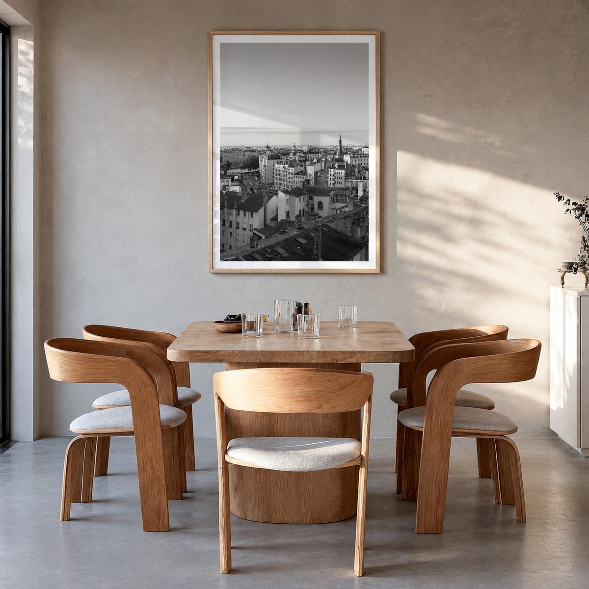Lyon black & white photo poster of France – vertical wall art in natural wood frame with white border, hanging on wall