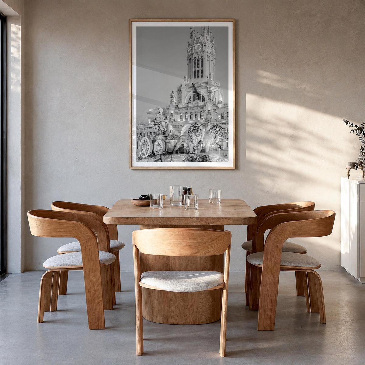 Madrid no. 3 black & white photo poster of Spain – vertical wall art in natural wood frame with white border, hanging on wall