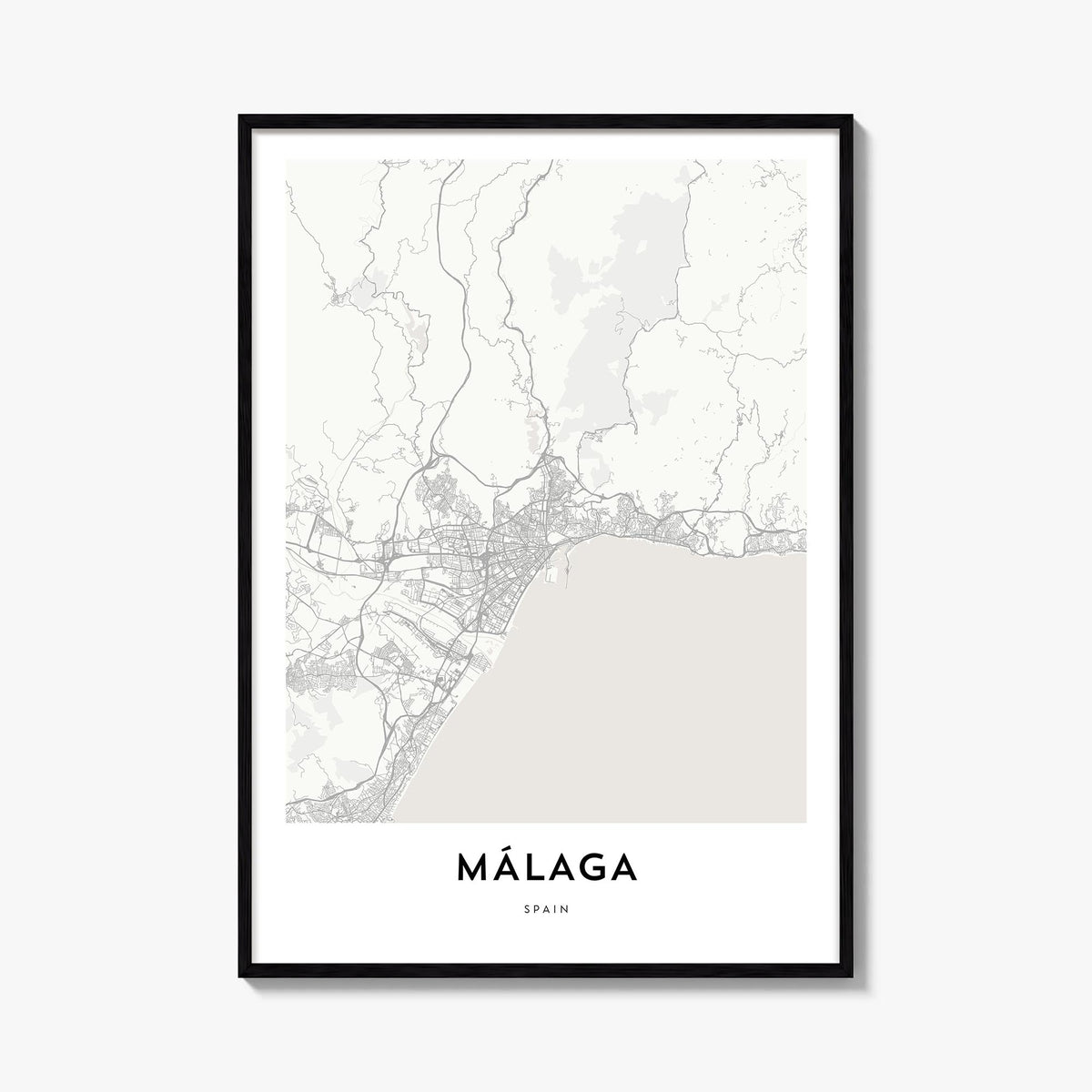 Málaga black & white map poster of Spain – vertical wall art, unframed print shown in interior mockup