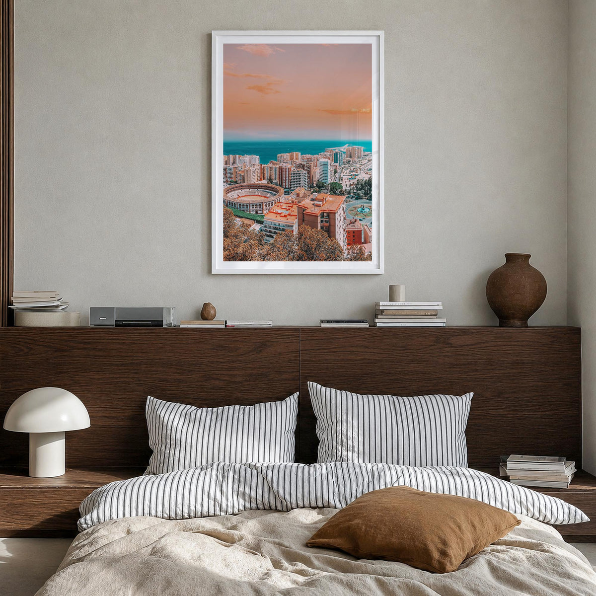 Málaga colorful photo poster of Spain – vertical wall art in white wood frame with white border, hanging on wall