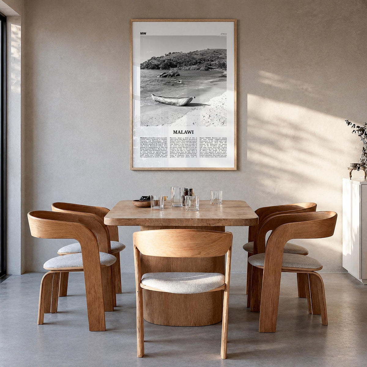 Malawi black & white newspaper poster of Africa – vertical wall art in natural wood frame, hanging on wall