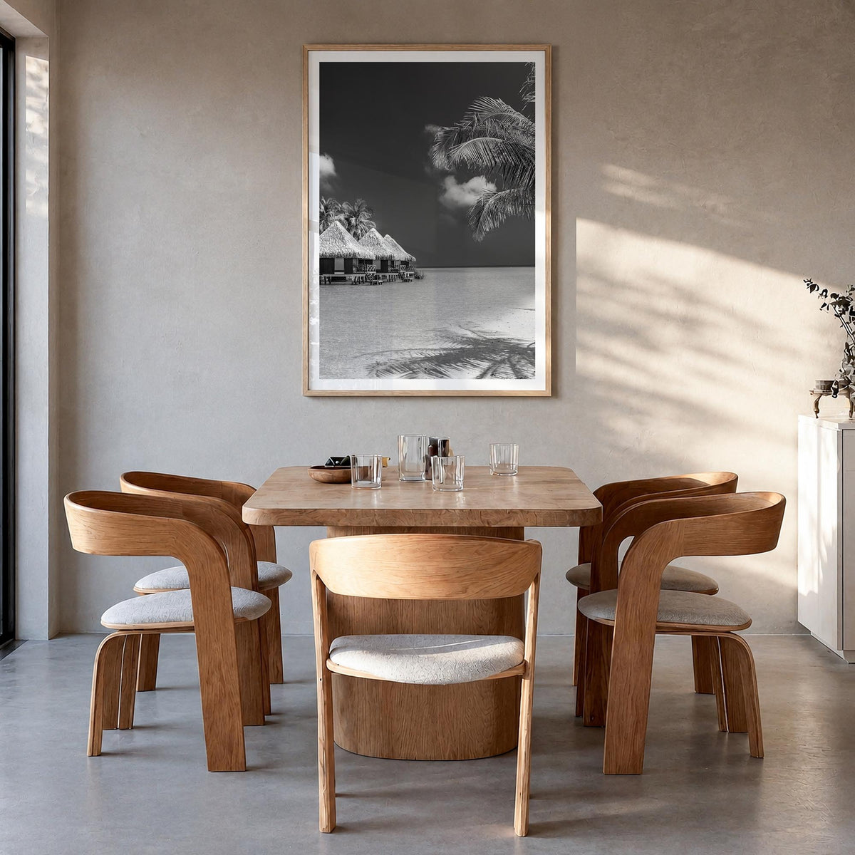 Maldives black & white photo poster of Asia – vertical wall art in natural wood frame with white border, hanging on wall