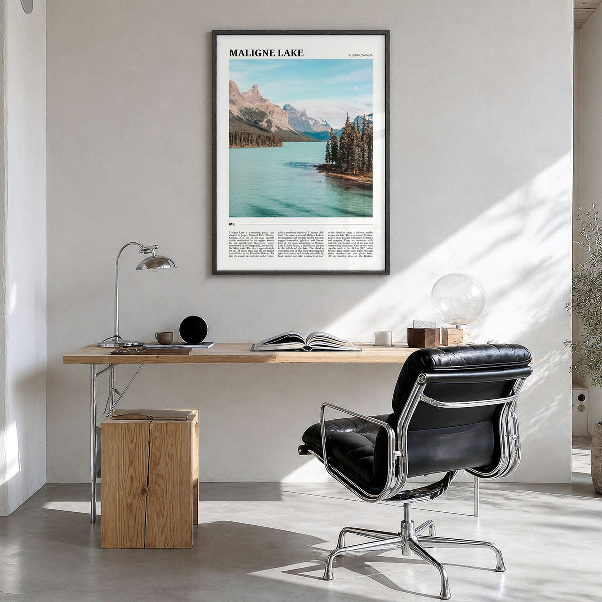 Maligne Lake Travel Poster in a black wood frame, hanging in a bright home office