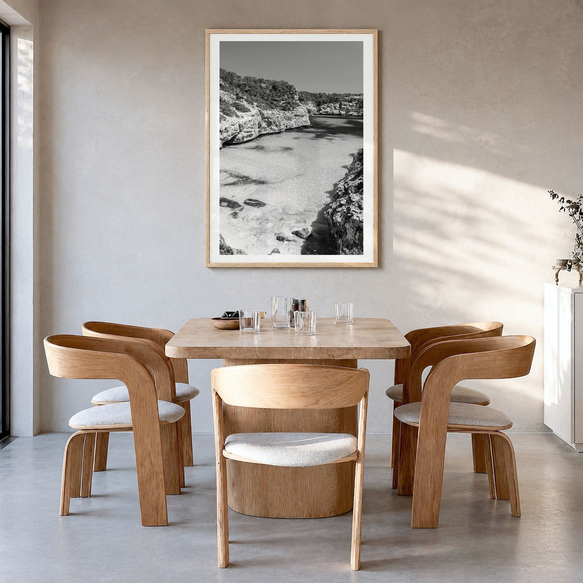 Mallorca Photo No 2 Poster in a natural wood frame, hanging in a dining room, white border