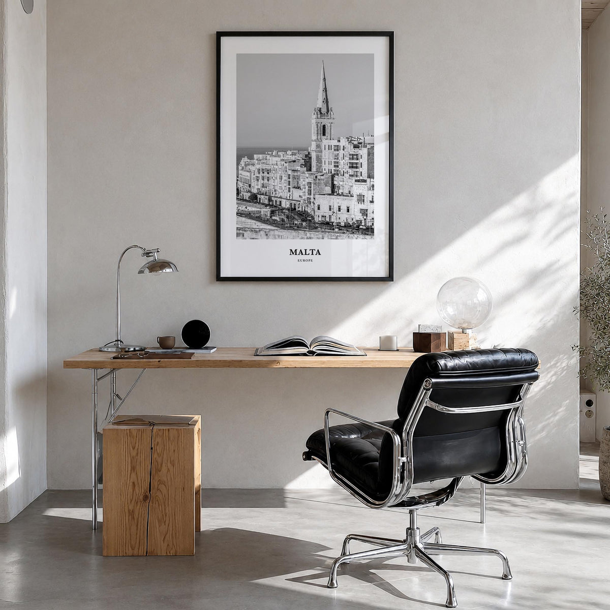 Malta black & white classic poster of Europe – vertical wall art in black wood frame, hanging on wall