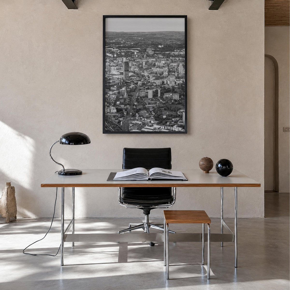 Manchester, England black & white photo poster of United Kingdom – vertical wall art in black wood frame, hanging on wall