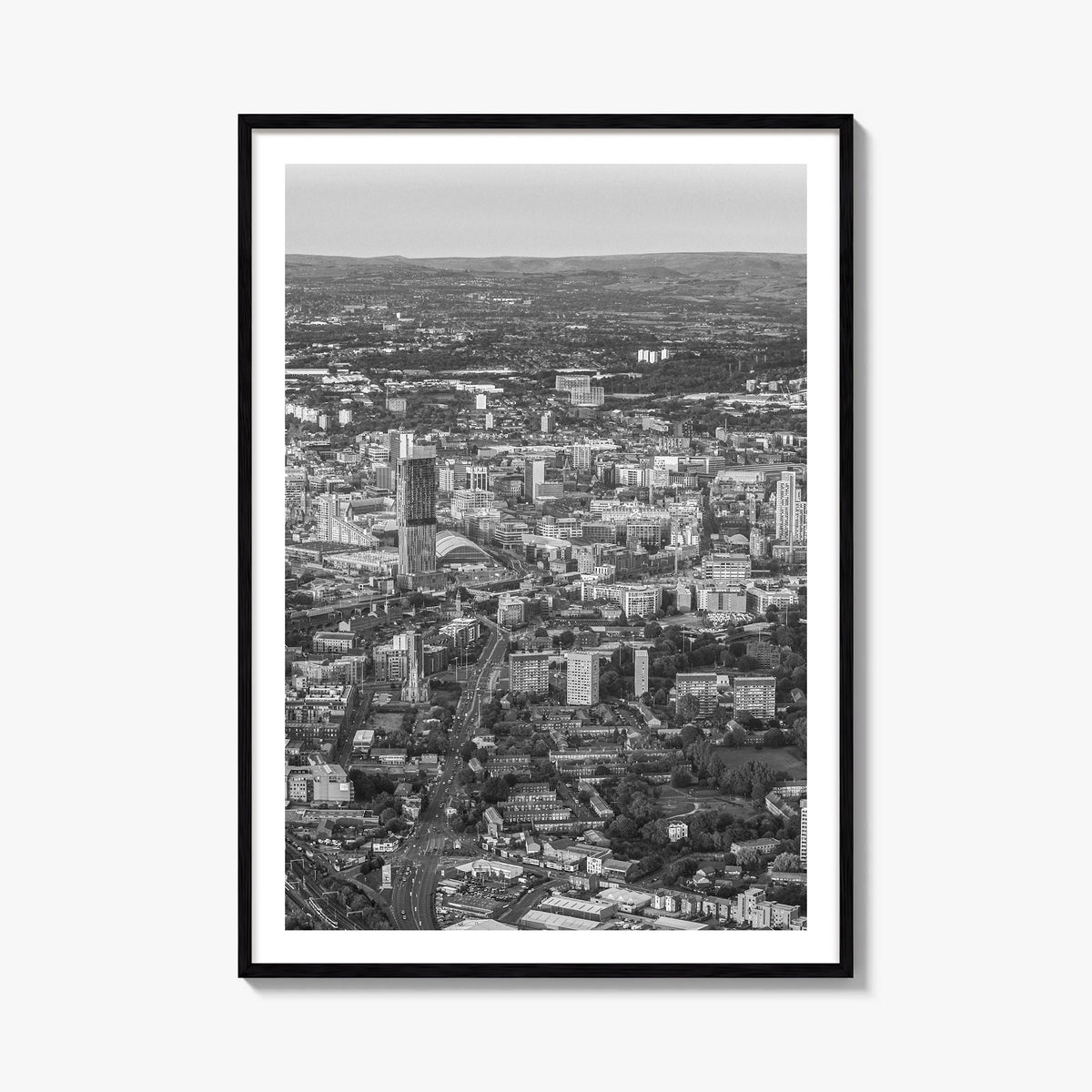 Manchester, England black & white photo poster of United Kingdom – vertical wall art, unframed print shown in interior mockup