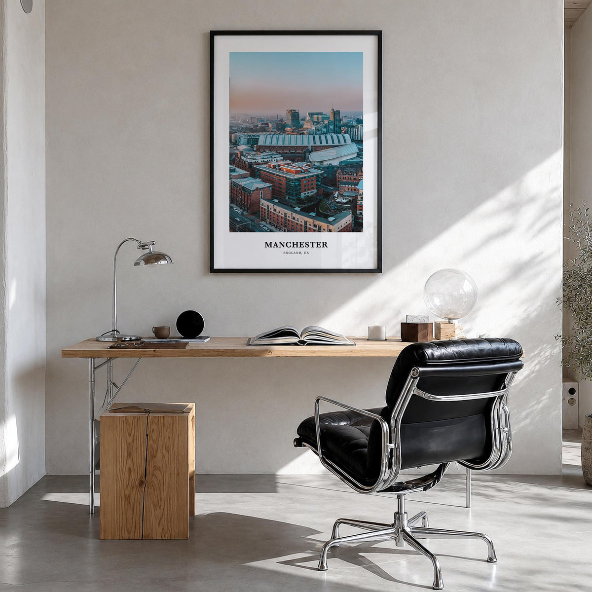 Manchester, England colorful classic poster of United Kingdom – vertical wall art in black wood frame, hanging on wall