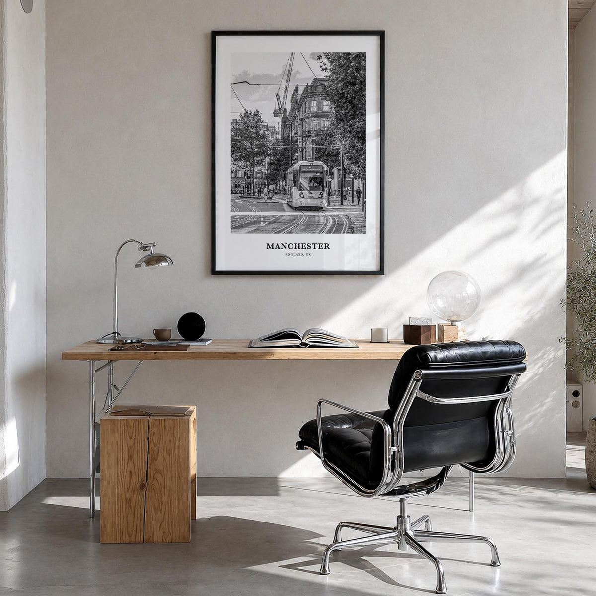 Manchester, England no. 1 black & white classic poster of United Kingdom – vertical wall art in black wood frame, hanging on