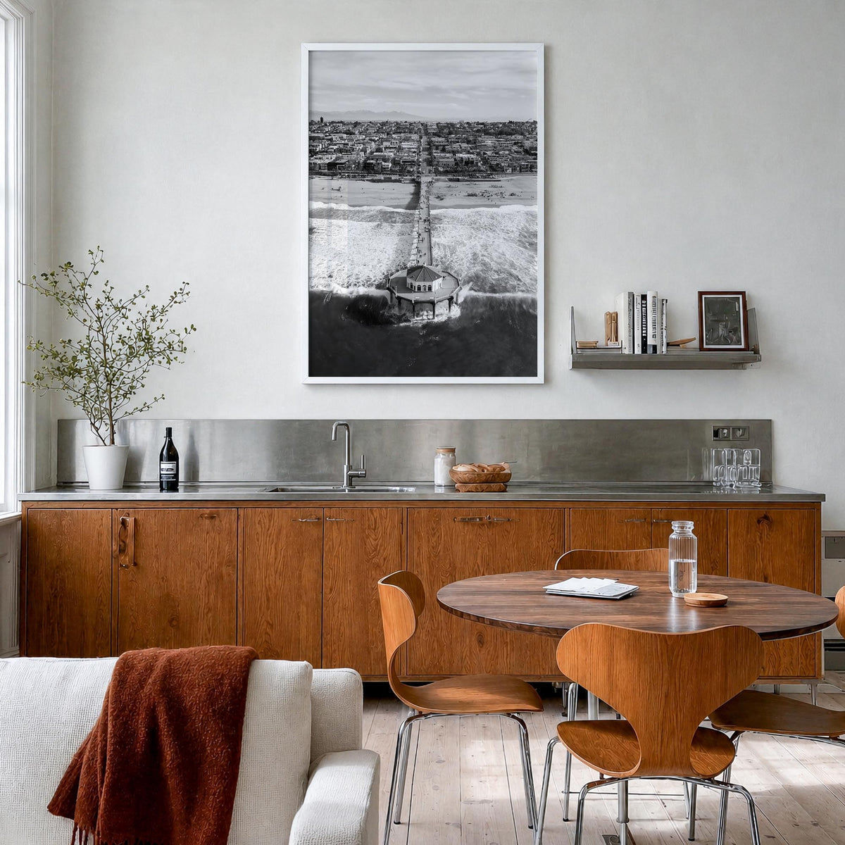 Manhattan Beach no. 1 black & white photo poster of California, USA – vertical wall art in white wood frame, hanging on wall