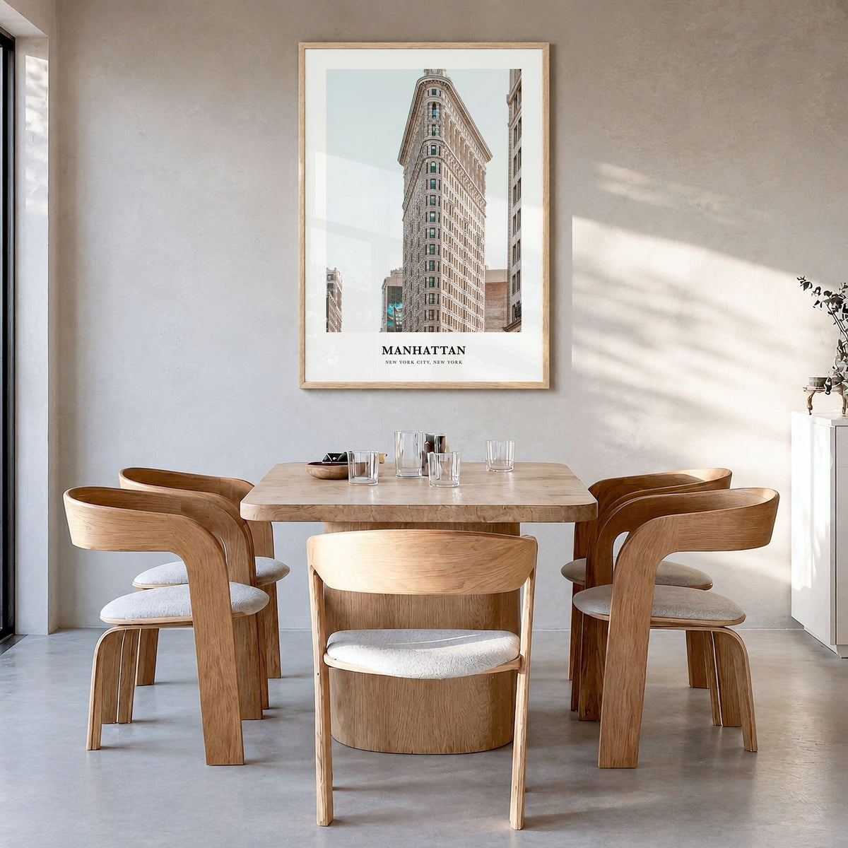 Manhattan Classic Poster in a natural wood frame, hanging in a dining room