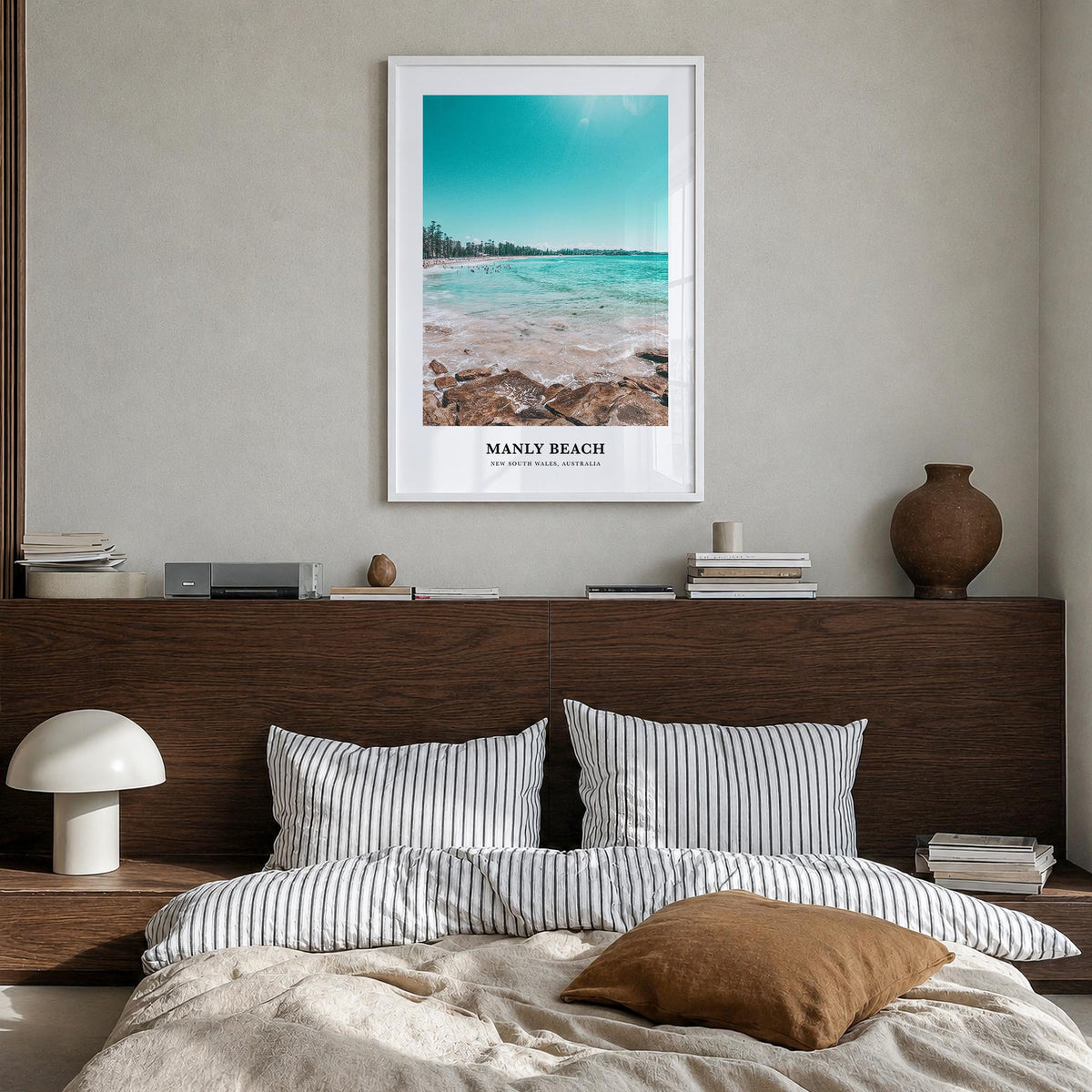 Manly Beach colorful classic poster of Sydney, New South Wales – vertical wall art in white wood frame, hanging on wall