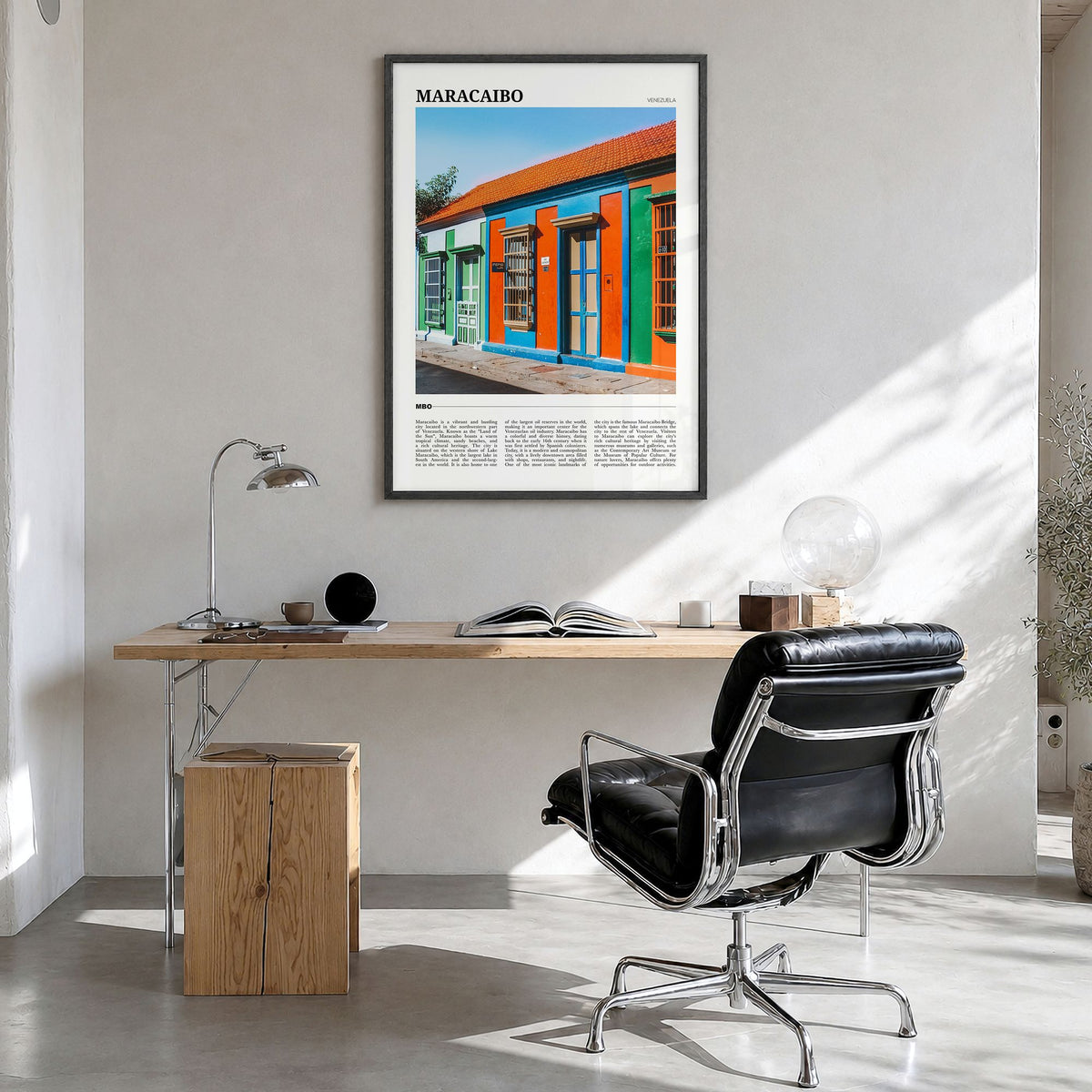 Maracaibo Travel Poster in a black wood frame, hanging in a bright home office