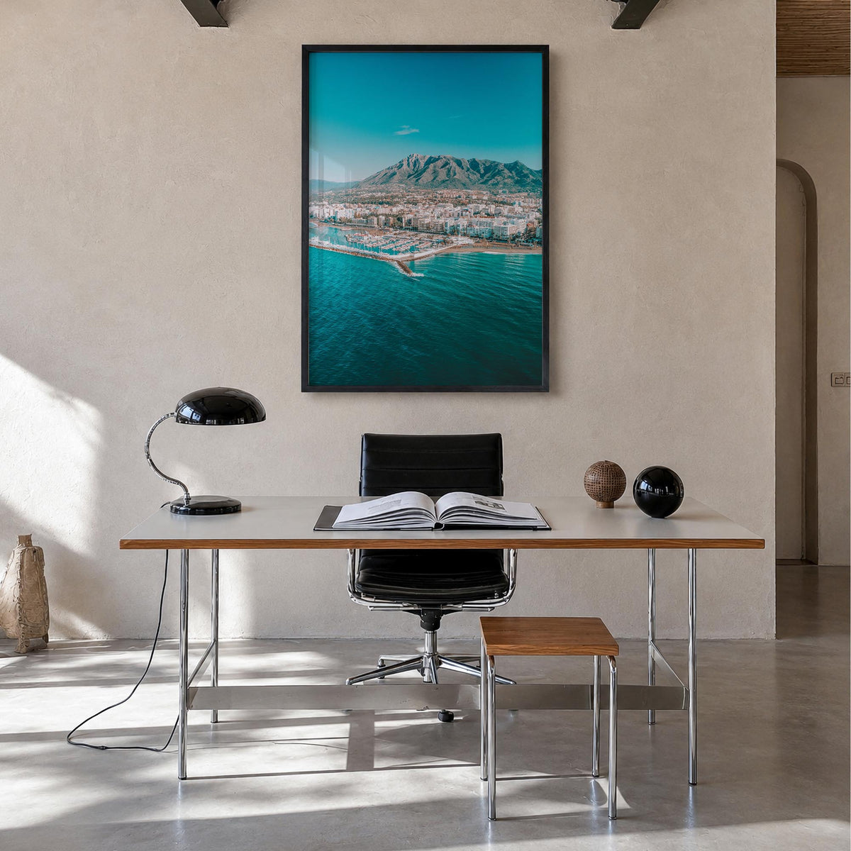 Marbella colorful photo poster of Spain – vertical wall art in black wood frame, hanging on wall