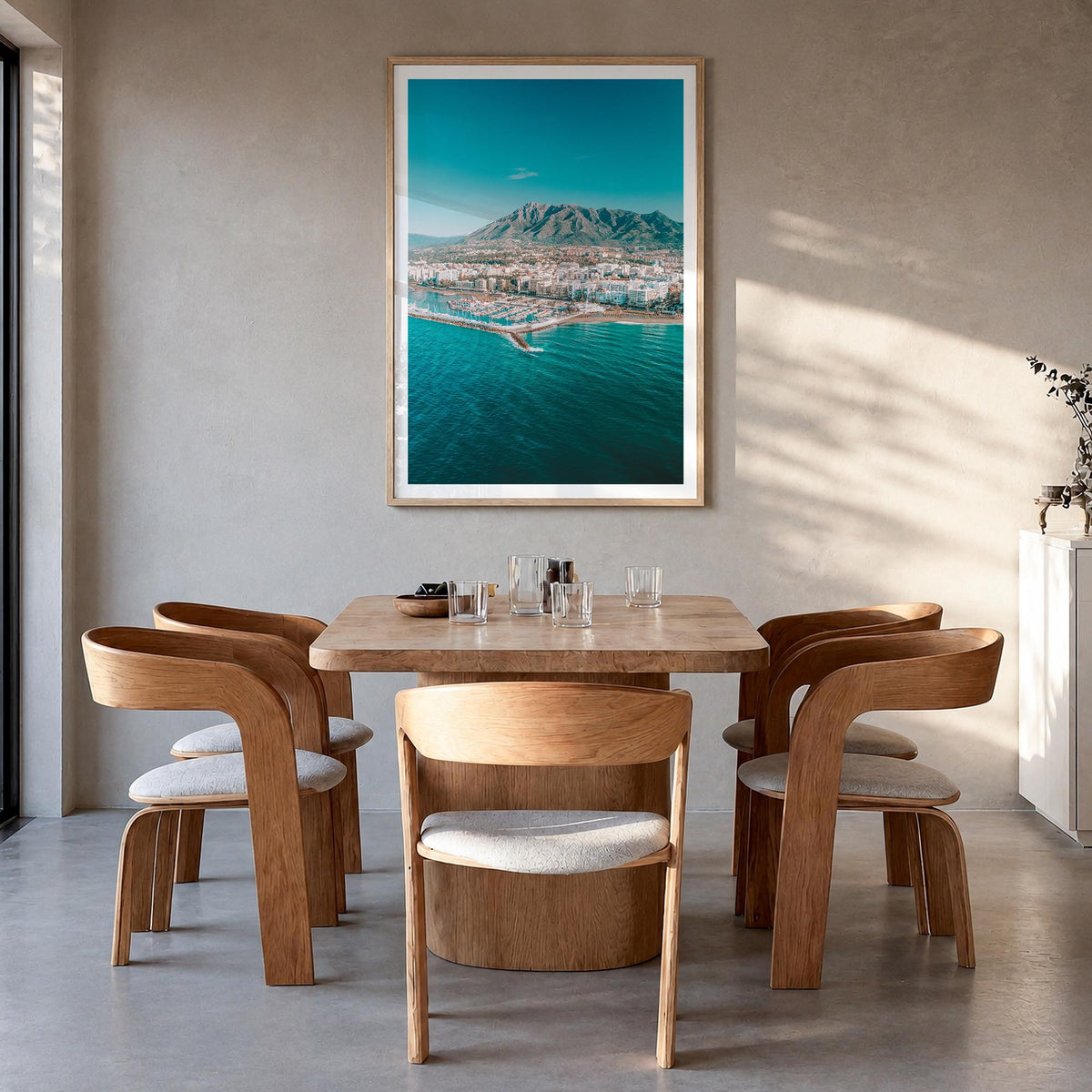 Marbella colorful photo poster of Spain – vertical wall art in natural wood frame with white border, hanging on wall