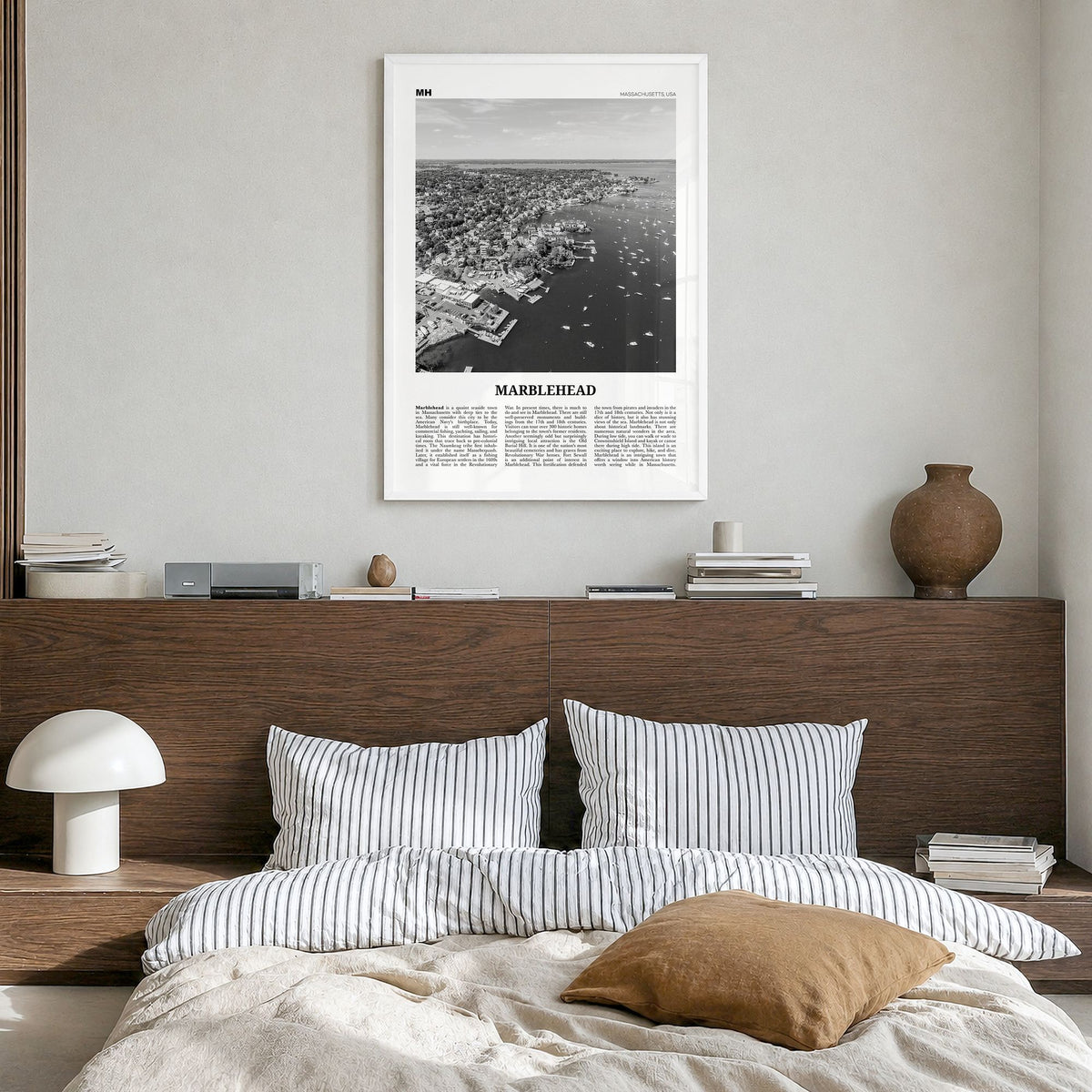 Marblehead Newspaper Poster in a white wood frame, hanging in a bedroom