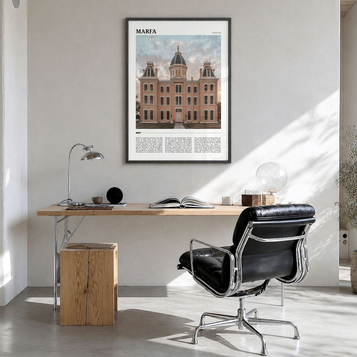 Marfa Travel Poster in a black wood frame, hanging in a bright home office